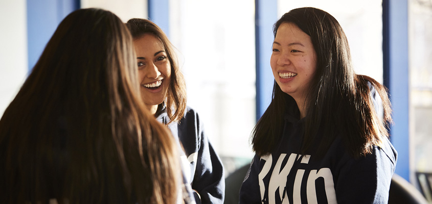 Group of undergraduate students chatting