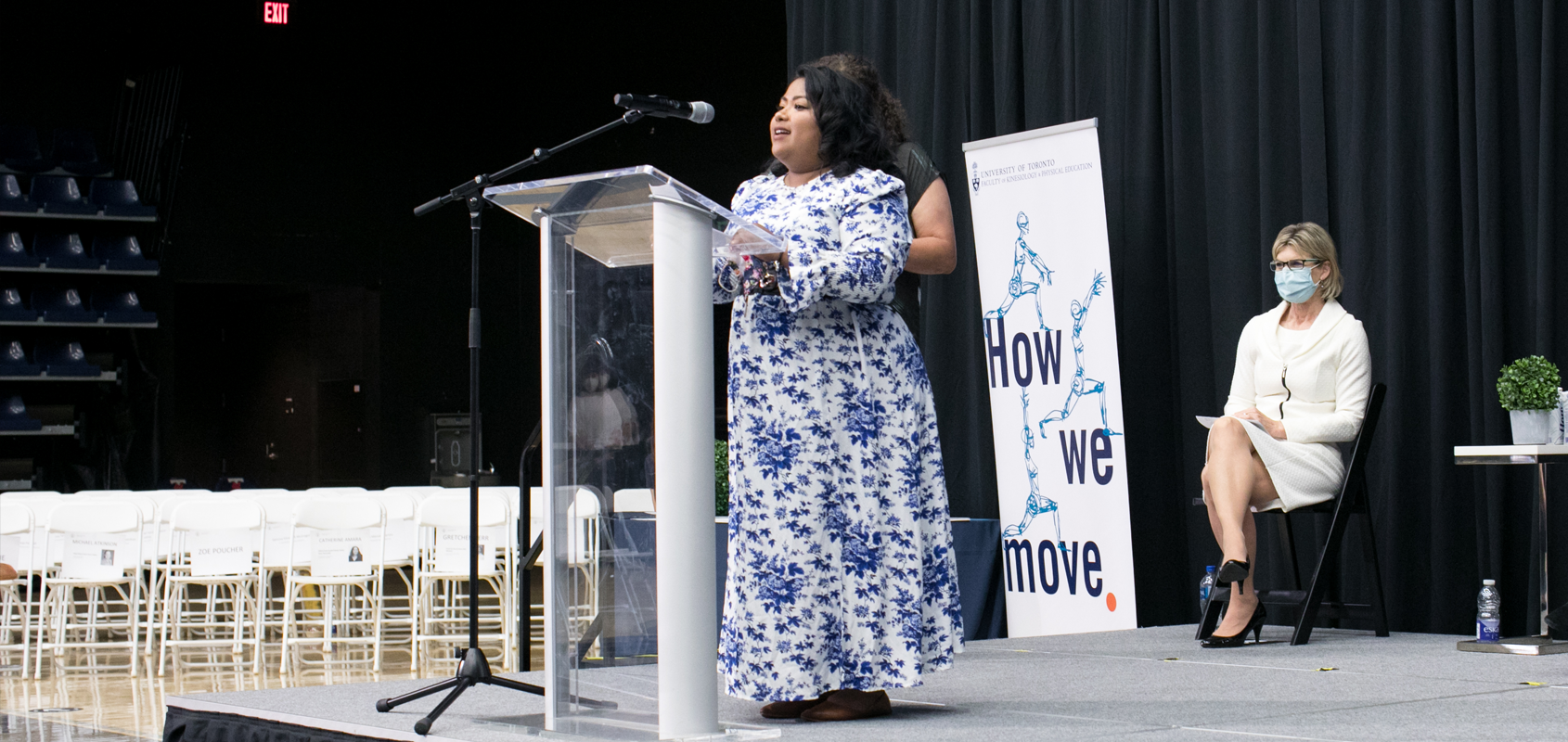 Stephanie Sarker speaking to guests at the 2022 KPE Graduation Reception