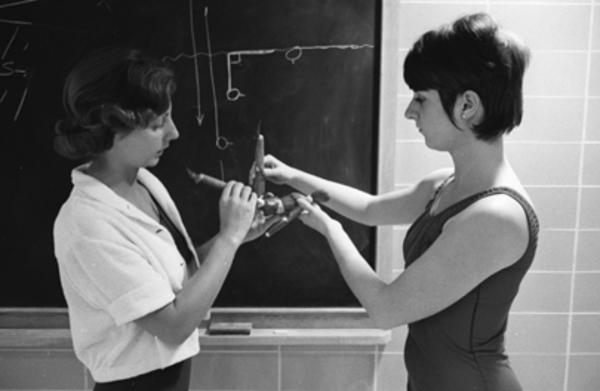 Sheila Romeiko teaching a swimming lesson, 1970