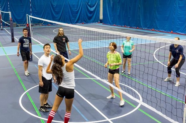 young-woman-volleyball-serve