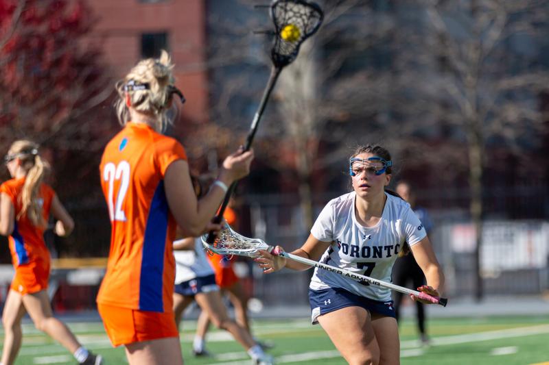 Lauren Wilcox playing women's lacrosse