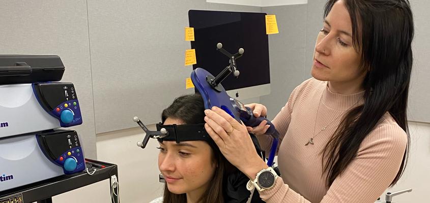 Jude Bek, on the right, will use non-invasive brain stimulation in the research to try to enhance effects of imagery and movement training