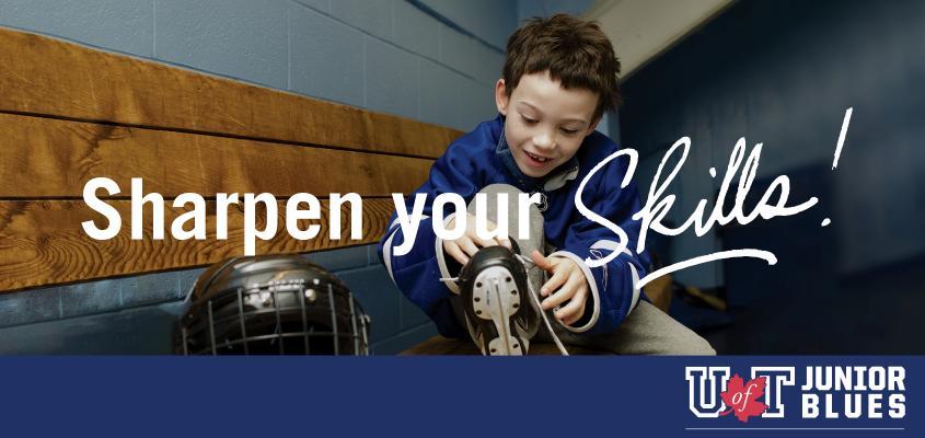 boy lacing up skates