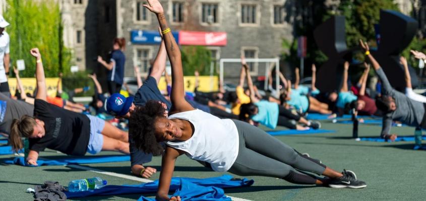 Students enjoying yoga at Play Day 2018