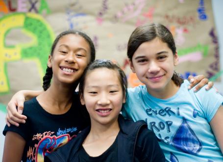 Three girls smiling