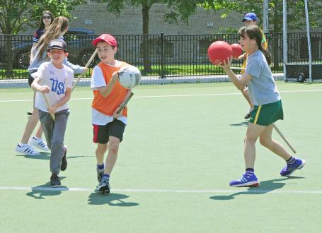 Kids playing Quittich a Harry potter themed game